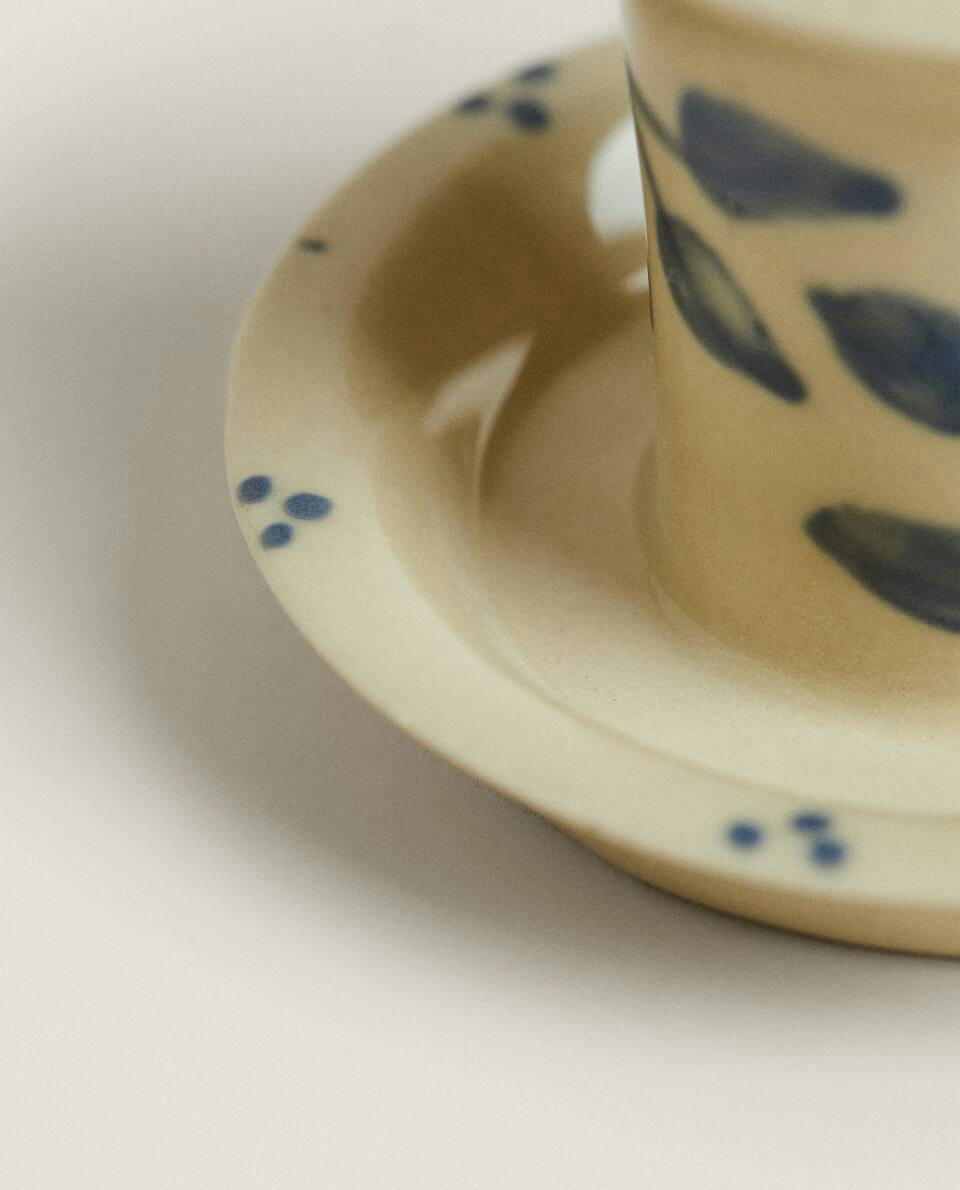 Candelero navideño de cerámica pintada