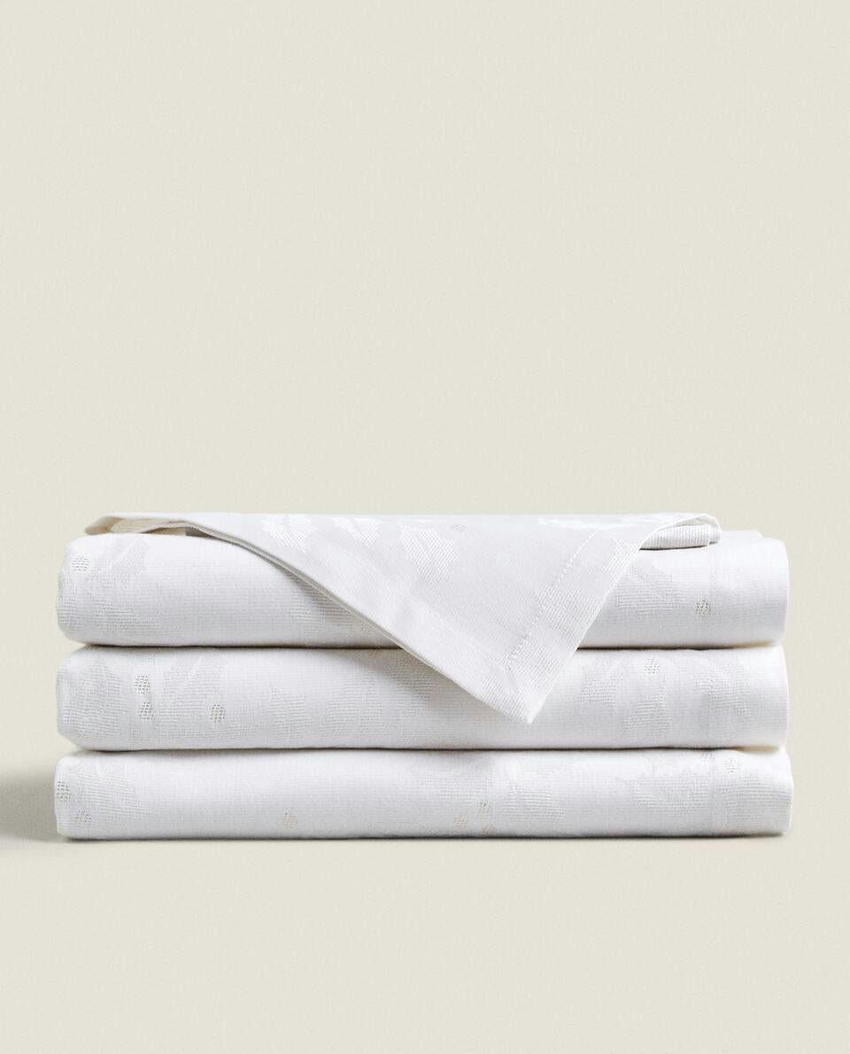 MANTEL JACQUARD FLORAL BRILLANTE NAVIDEÑO