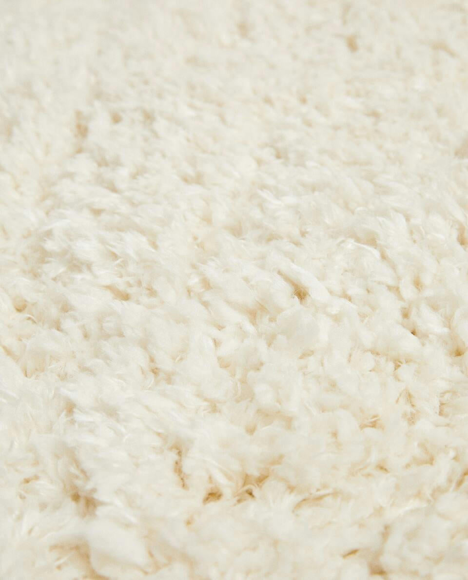 TAPPETO MORBIDO AL TATTO