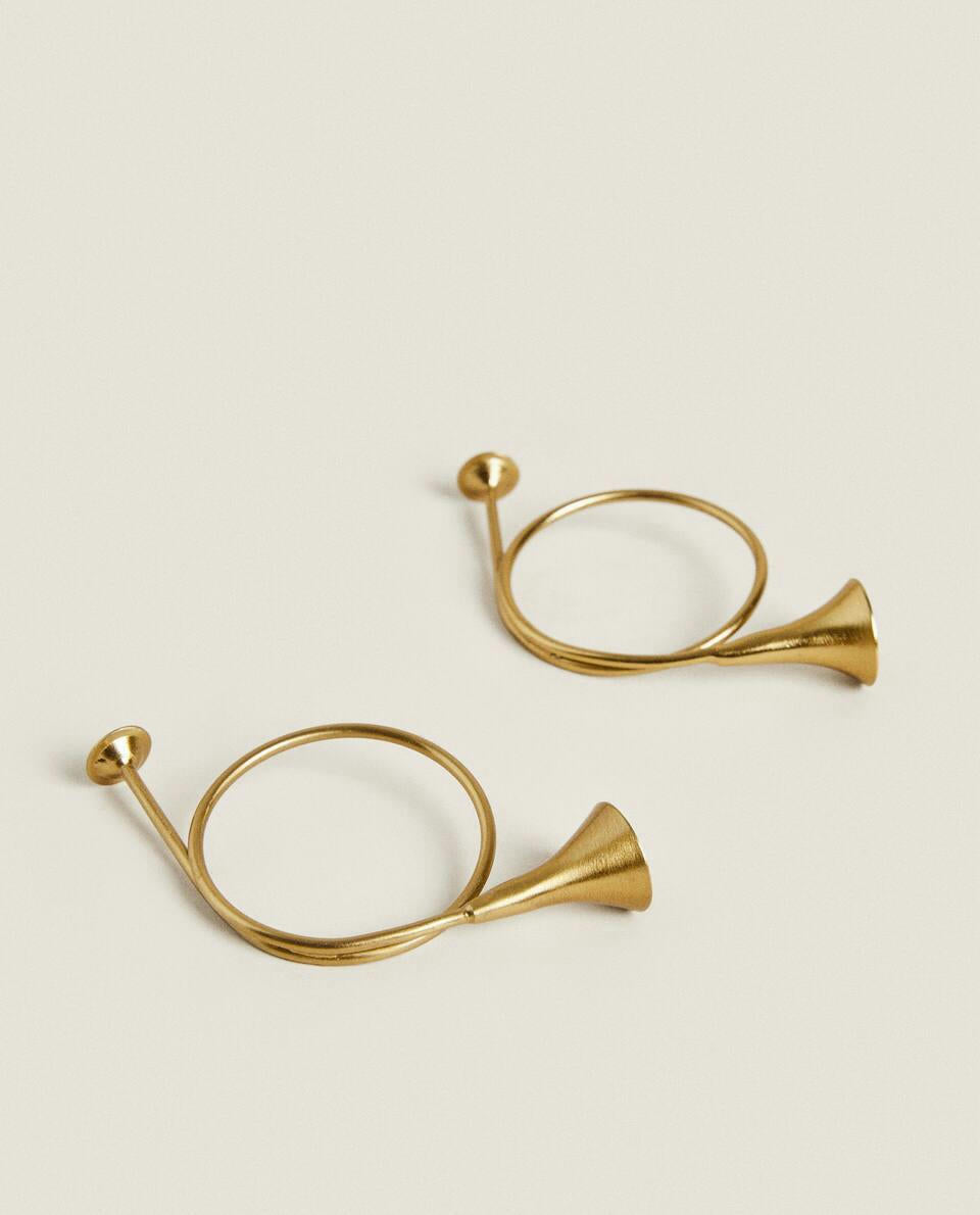 CONFEZIONE DI ANELLI PORTATOVAGLIOLI A FORMA DI TROMBA DI NATALE (CONFEZIONE DA 2) 