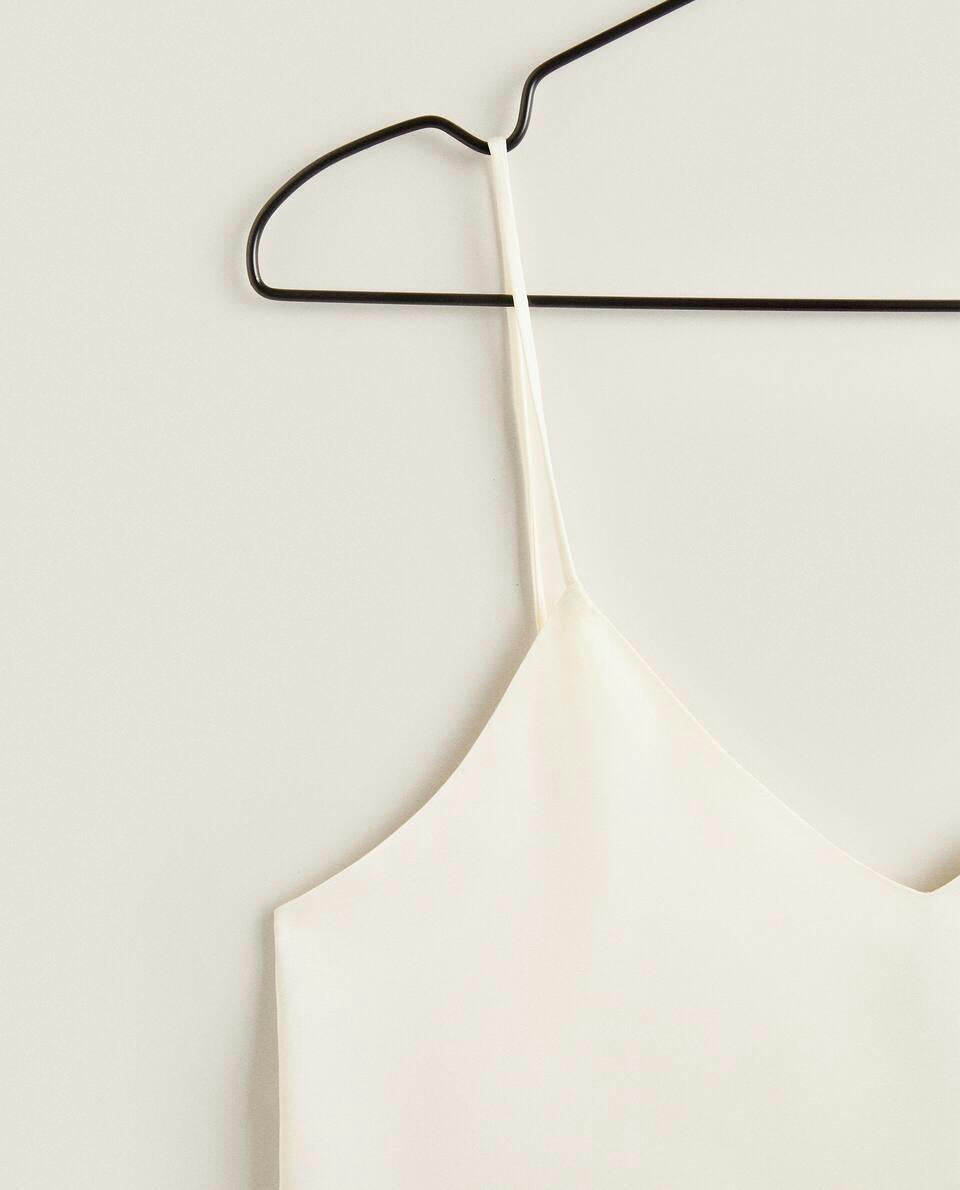 TOP IN RASO CON PIZZO BIONDO 