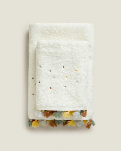 ASCIUGAMANO CON NAPPINE E STELLE 