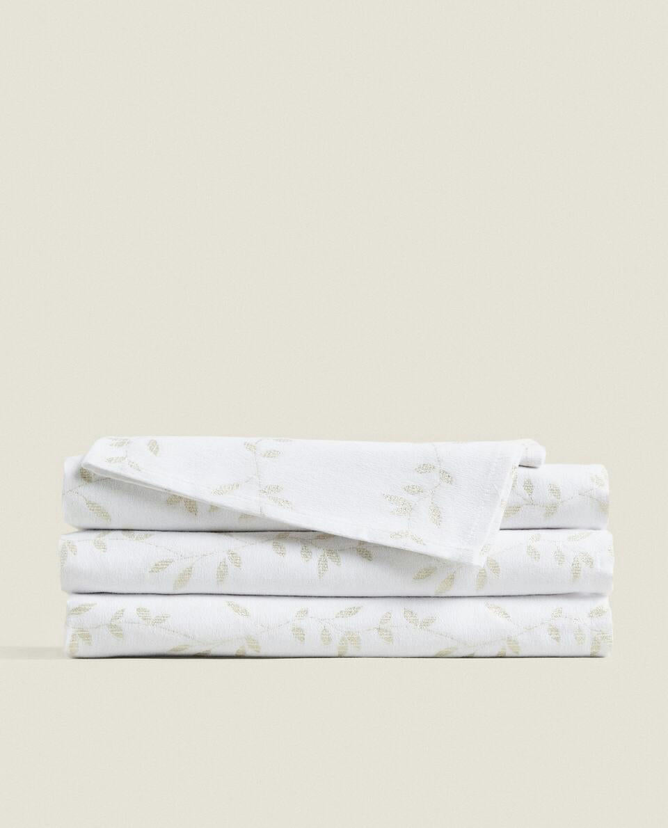 MANTEL DE ALGODÓN CON HOJAS NAVIDEÑAS BRILLANTES 