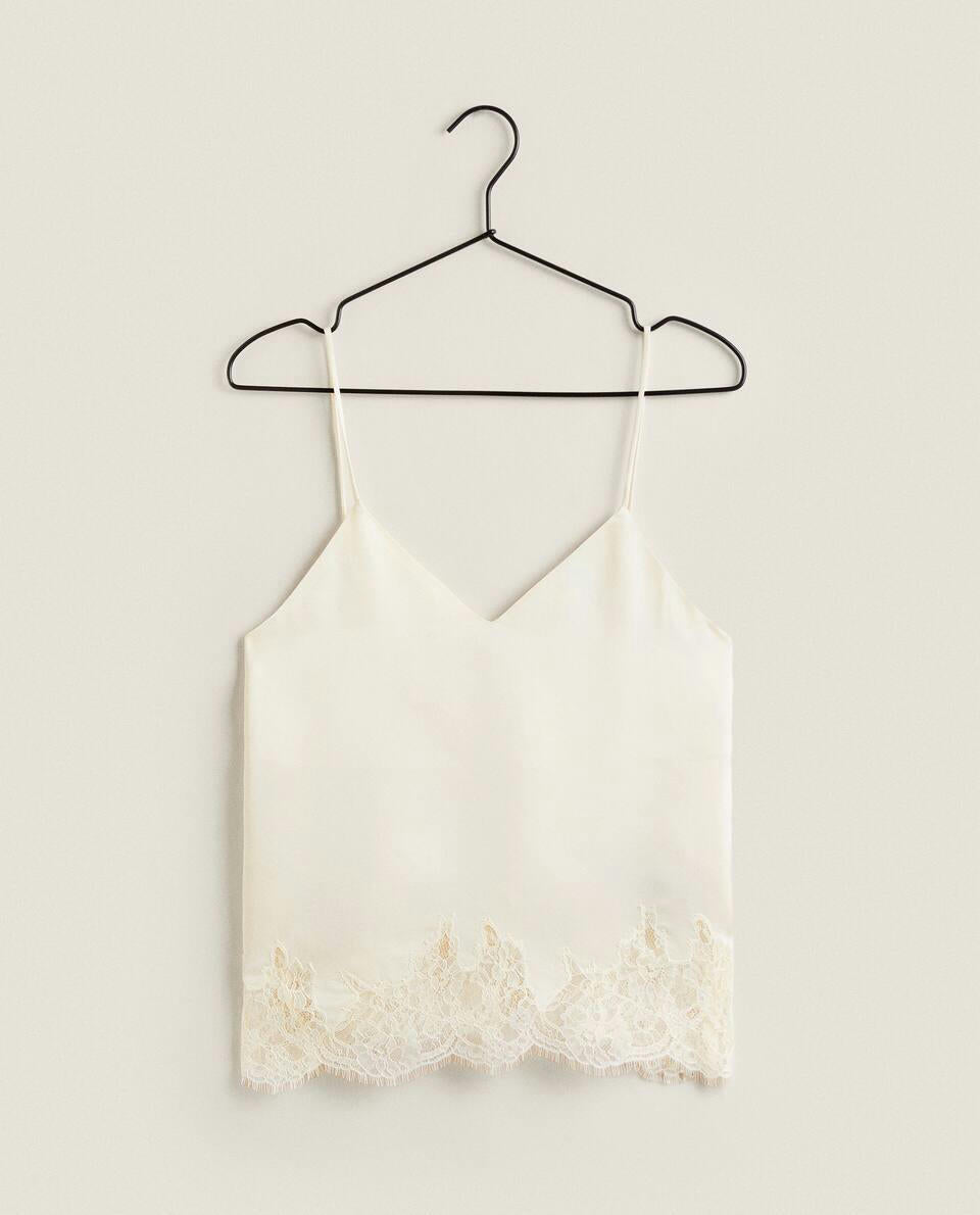 TOP IN RASO CON PIZZO BIONDO 