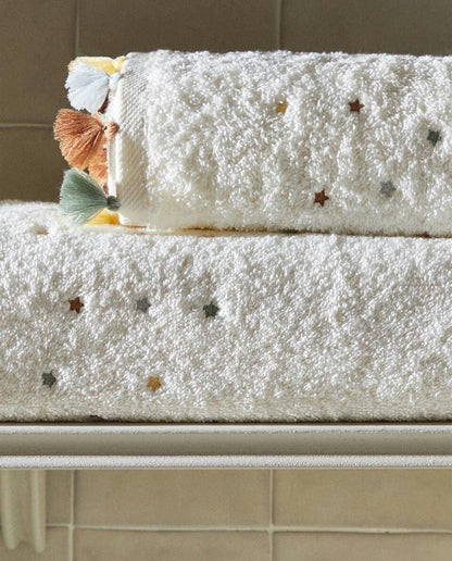 ASCIUGAMANO CON NAPPINE E STELLE 