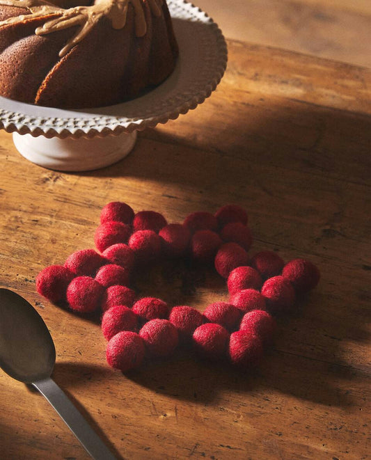 SOTTOPENTOLA DI LANA A FORMA DI STELLA DI NATALE 