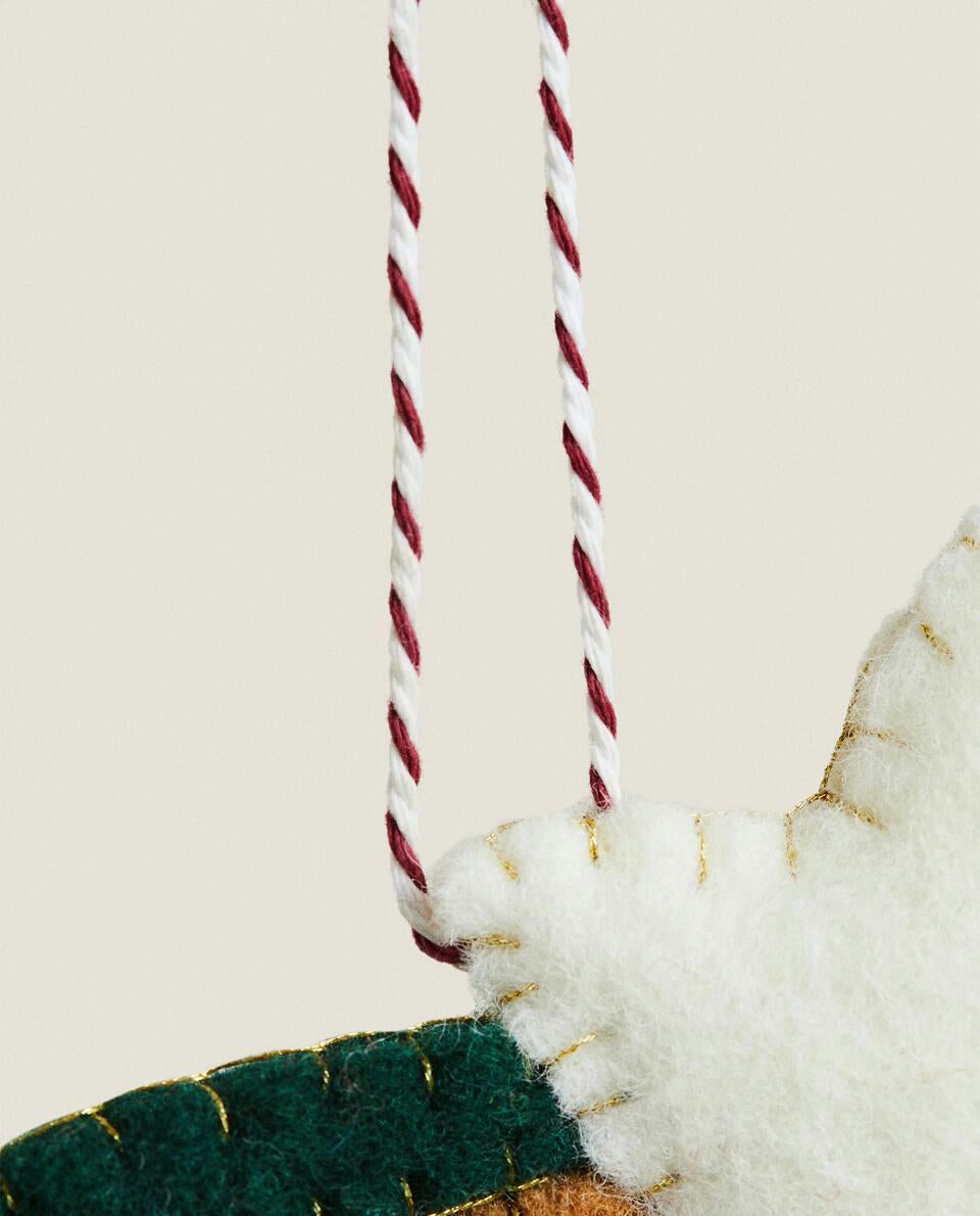 DECORAZIONE NATALIZIO A STELLA IN FELTRO 