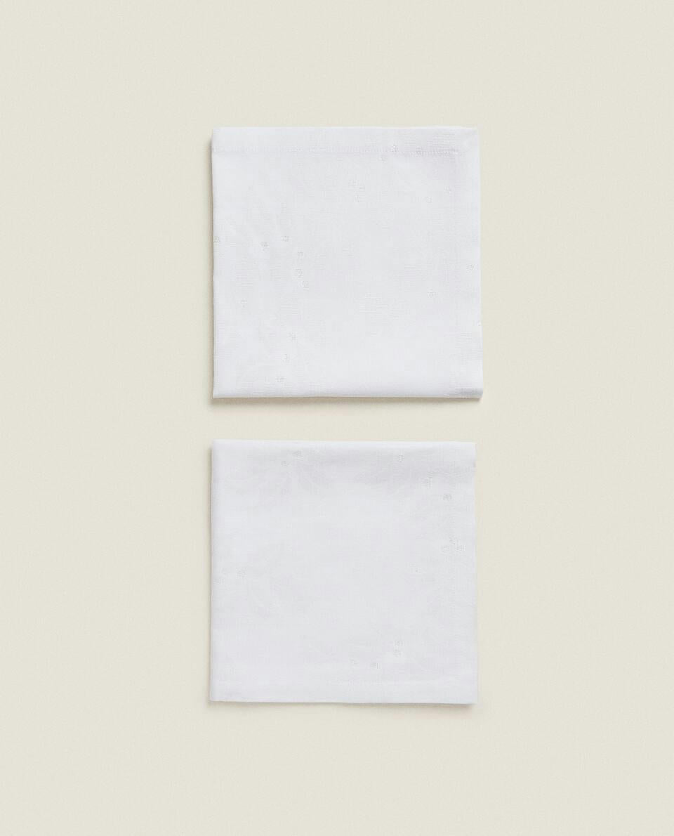 CONFEZIONE DI TOVAGLIOLI NATALIZI CON LUCENTEZZA FLOREALE JACQUARD (CONFEZIONE DA 2) 