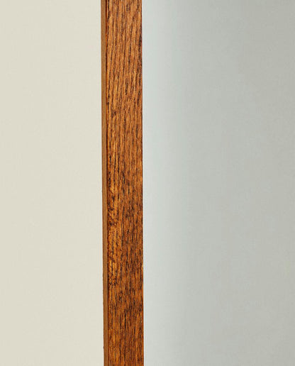 ESPEJO VERTICAL REDONDO CON MARCO 