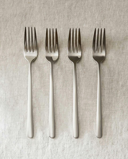 CAJA DE 4 TENEDORES DE ACERO BRILLANTE 