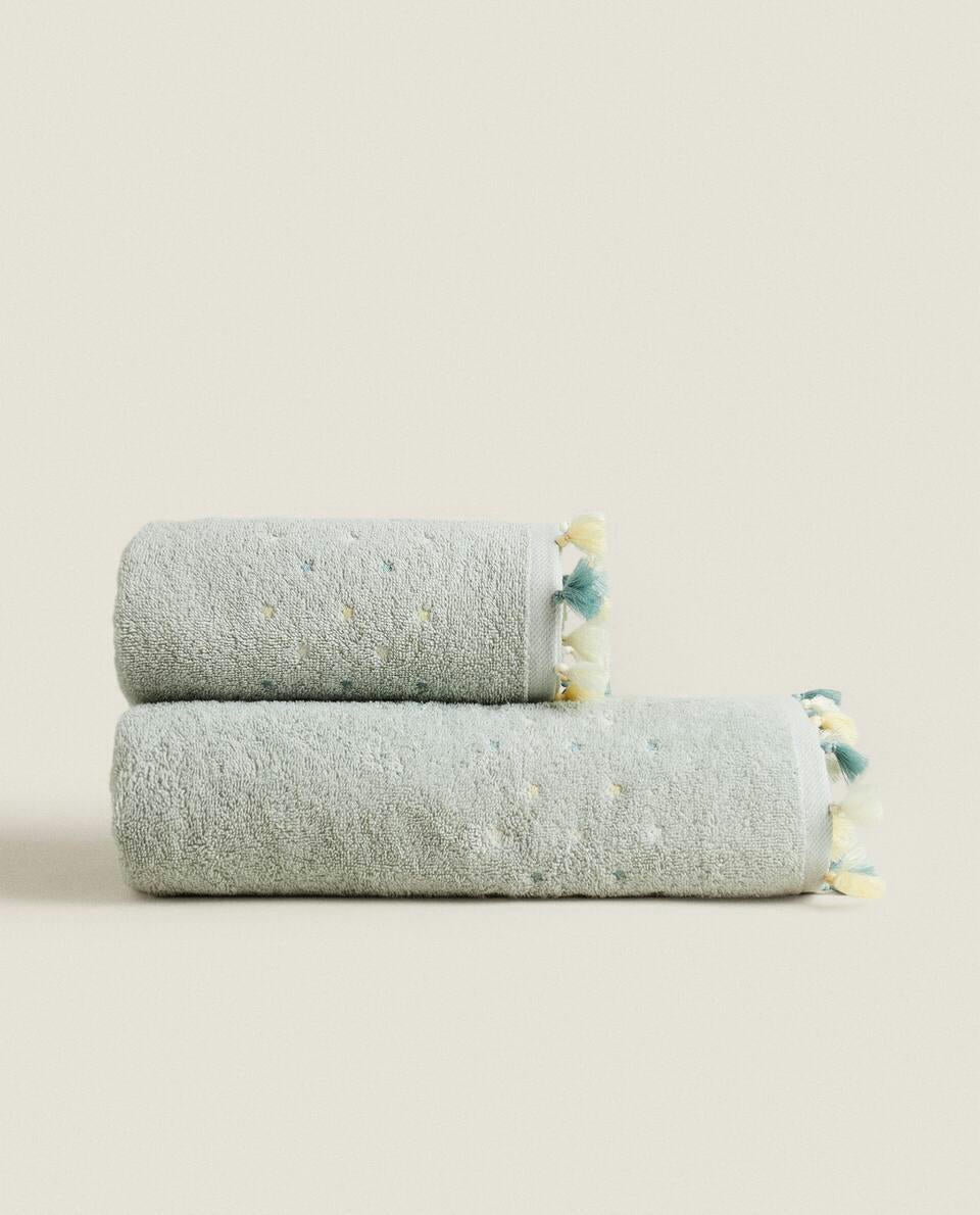 ASCIUGAMANO CON NAPPINE E STELLE 