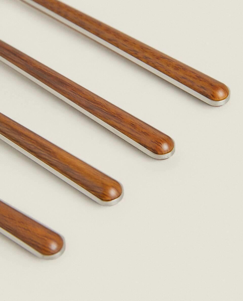 DETTAGLIO SCATOLA 4 FORCHETTE CON MANICO TONDO 