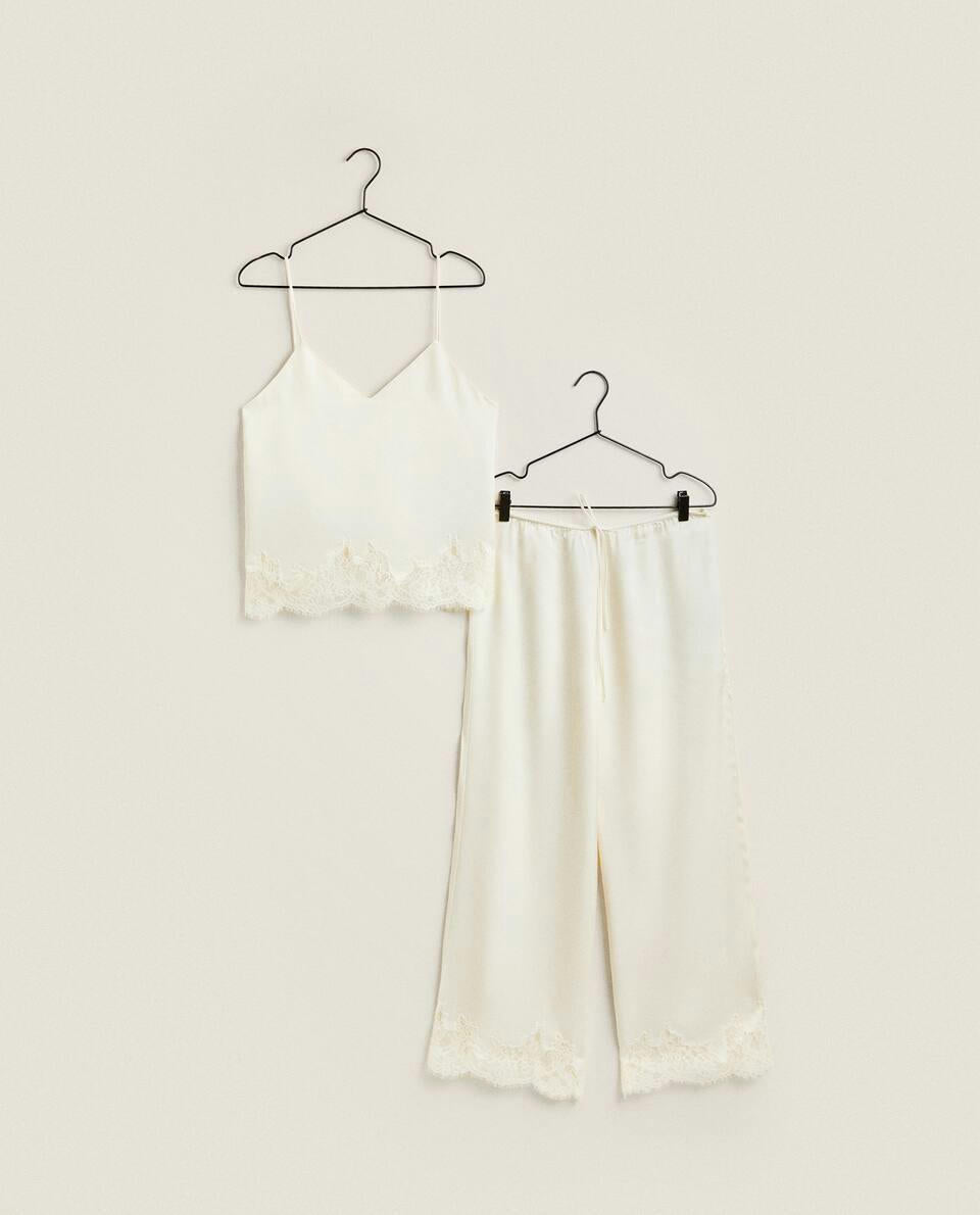 TOP IN RASO CON PIZZO BIONDO 