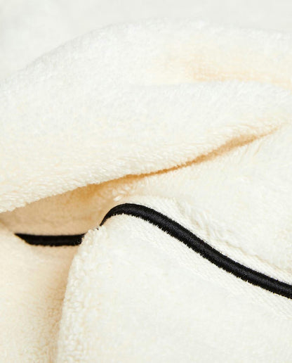 ASCIUGAMANO CON BORDO SMERLATO RICAMATO 