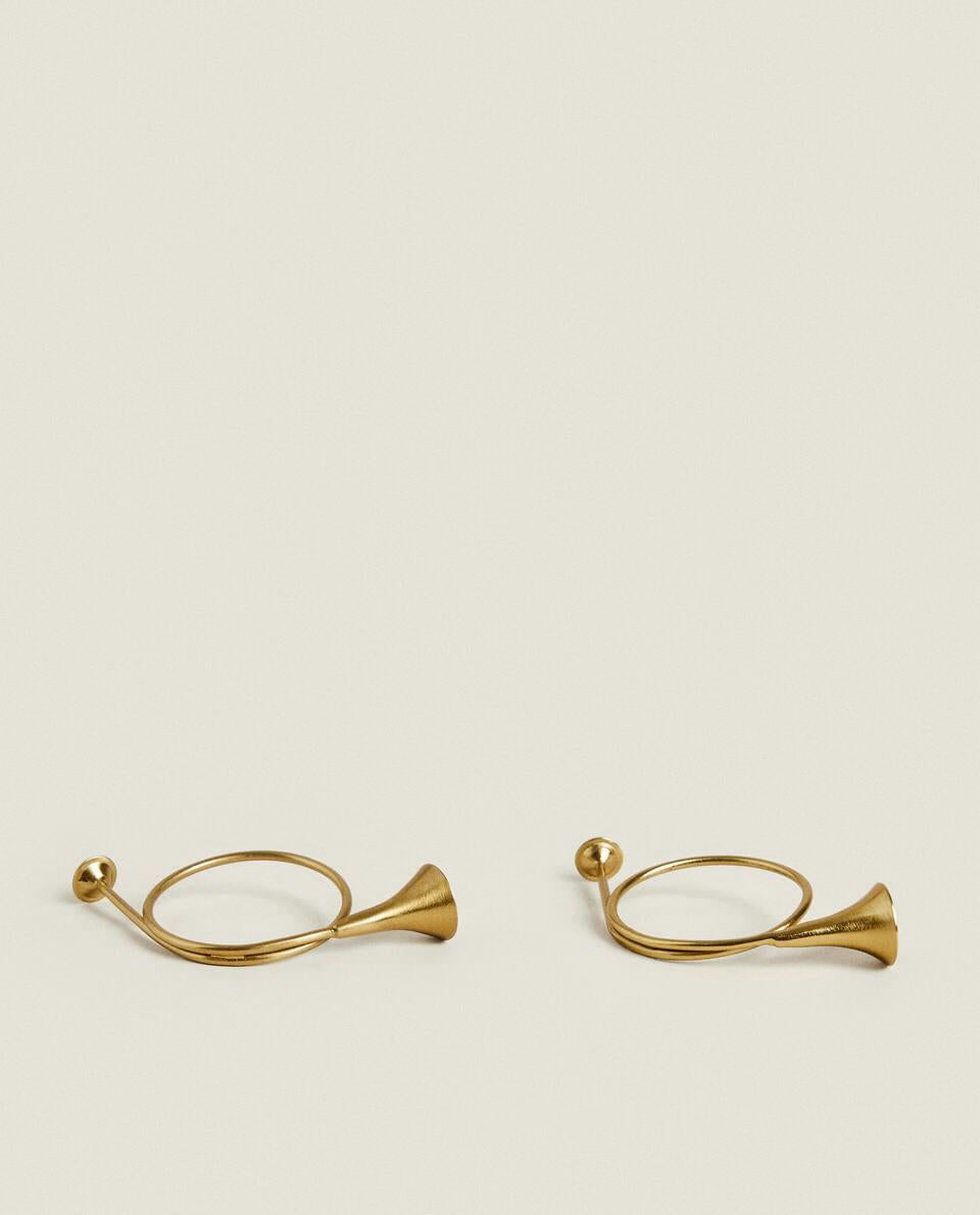 CONFEZIONE DI ANELLI PORTATOVAGLIOLI A FORMA DI TROMBA DI NATALE (CONFEZIONE DA 2) 