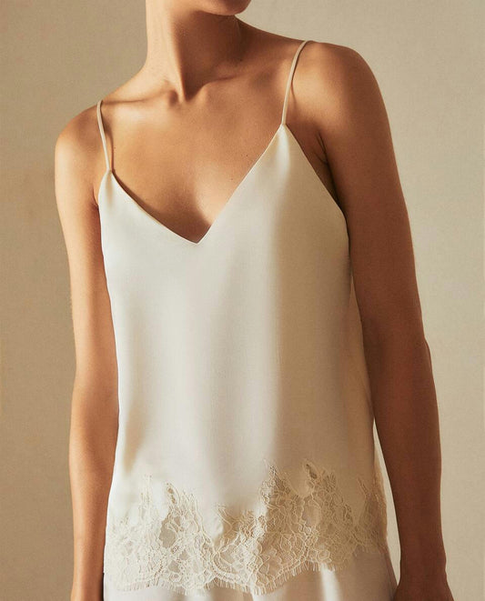 TOP IN RASO CON PIZZO BIONDO 