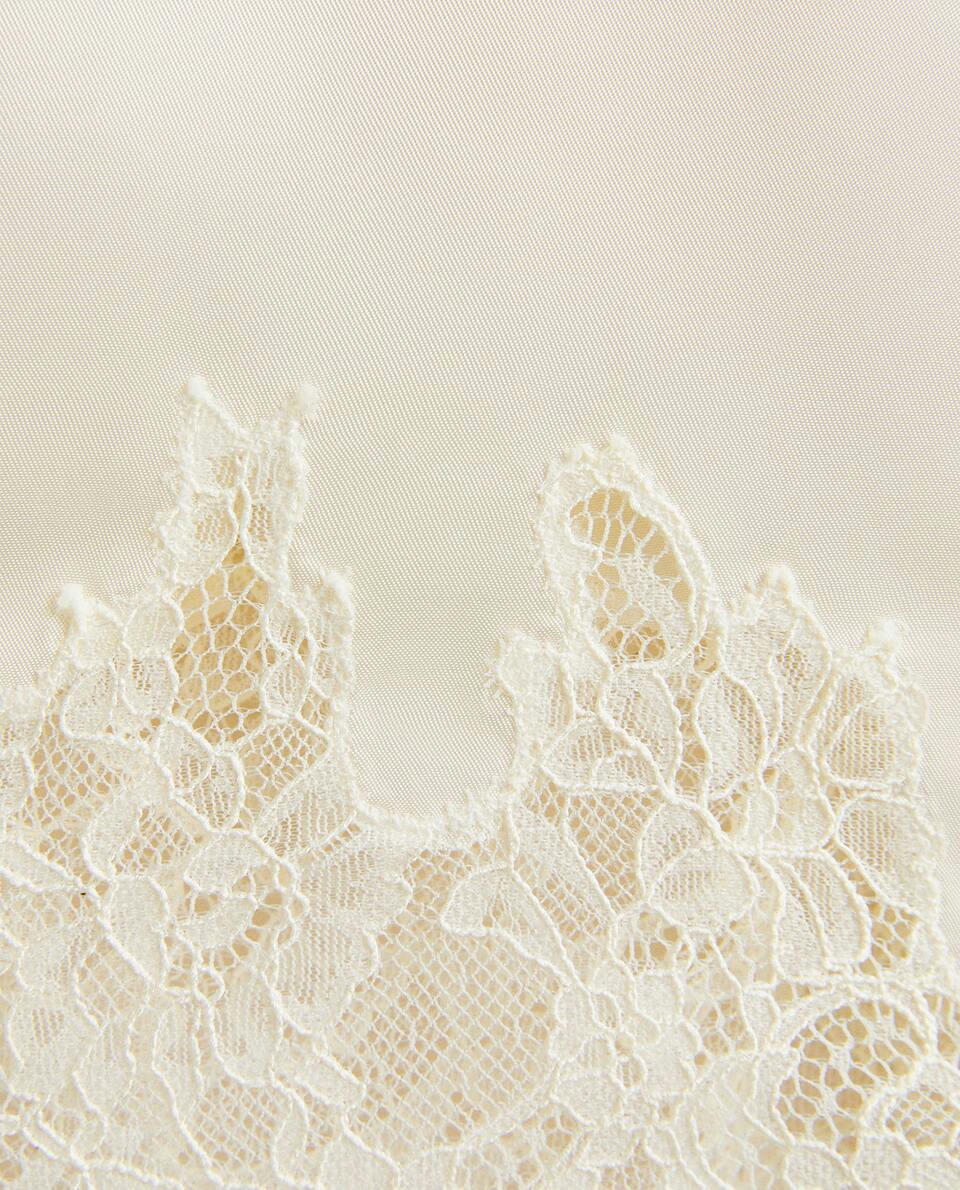 TOP IN RASO CON PIZZO BIONDO 