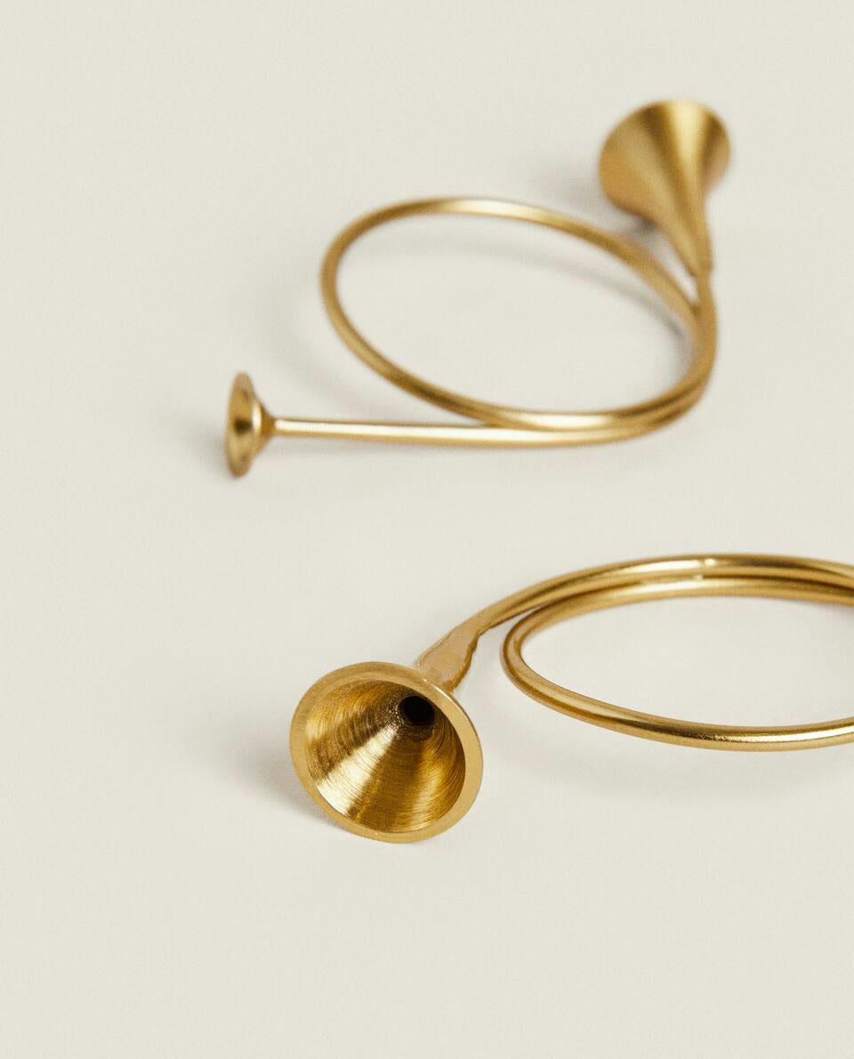 CONFEZIONE DI ANELLI PORTATOVAGLIOLI A FORMA DI TROMBA DI NATALE (CONFEZIONE DA 2) 